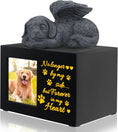 Load image into Gallery viewer, LovfurBlack pet urn on a wooden table with a photo frame and decorative elements.