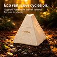 Load image into Gallery viewer, LovFur™ pyramid mycelium pet urn placed in nature, a biodegradable pet memorial urn designed for a gentle, eco-friendly farewell.