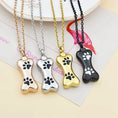 Load image into Gallery viewer, Pet Ashes Necklace – Dog Bone Pendant with Paw Print
